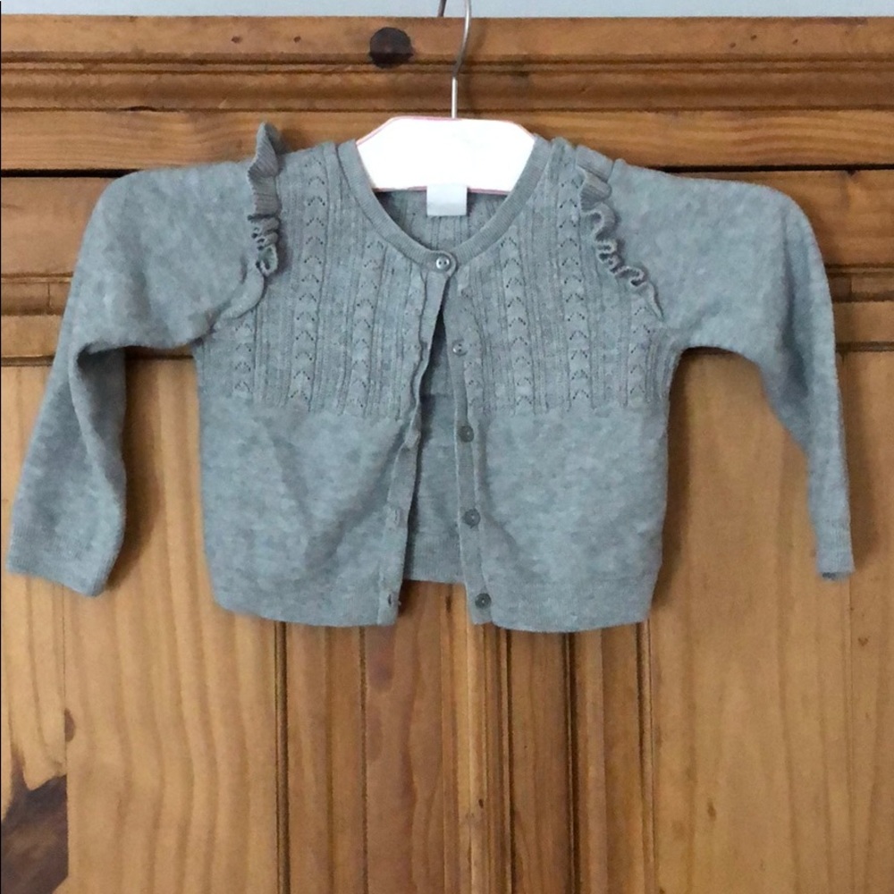Gray sweater with ruffle detail